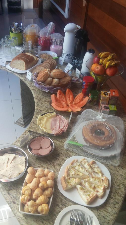 Suites Vila Nova Suica Acomodação com café da manhã 