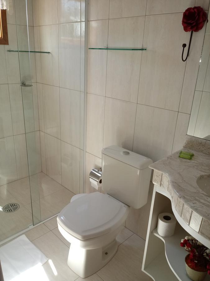 Acomodação com café da manhã  Suites Vila Nova Suica Campos do Jordão