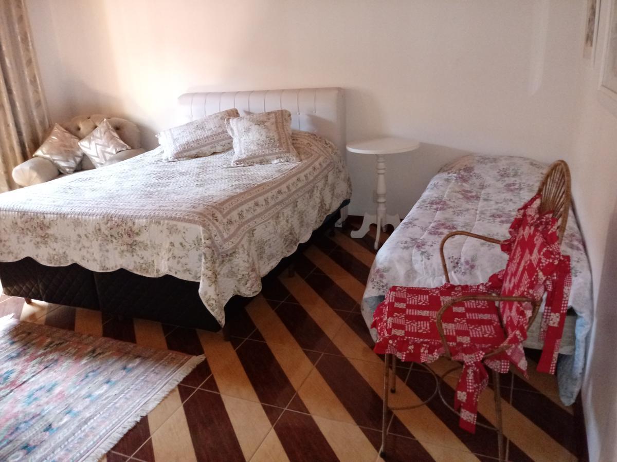 Acomodação com café da manhã  Suites Vila Nova Suica