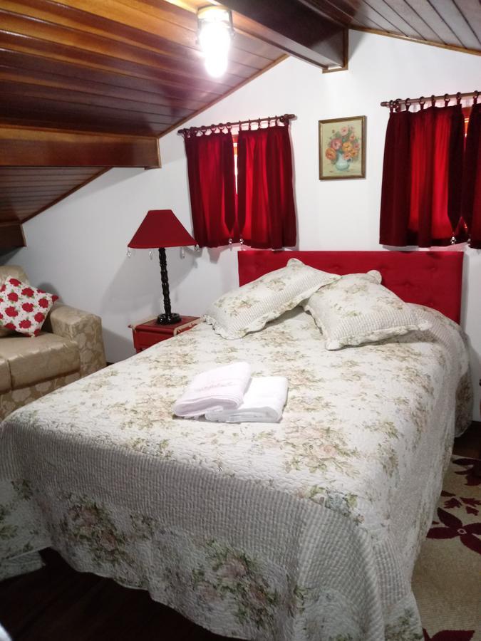 Suites Vila Nova Suica Acomodação com café da manhã  Campos do Jordão